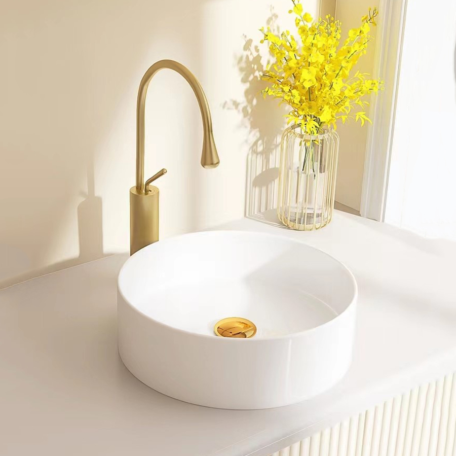 Salle de bains ronde blanche en céramique, style simple, au-dessus du comptoir, lavabo d'art, lavabo à main pour la maison, vente en gros