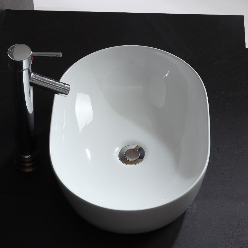 Lavabo d'art ovale moderne en céramique, au-dessus du lavabo de salle de bain